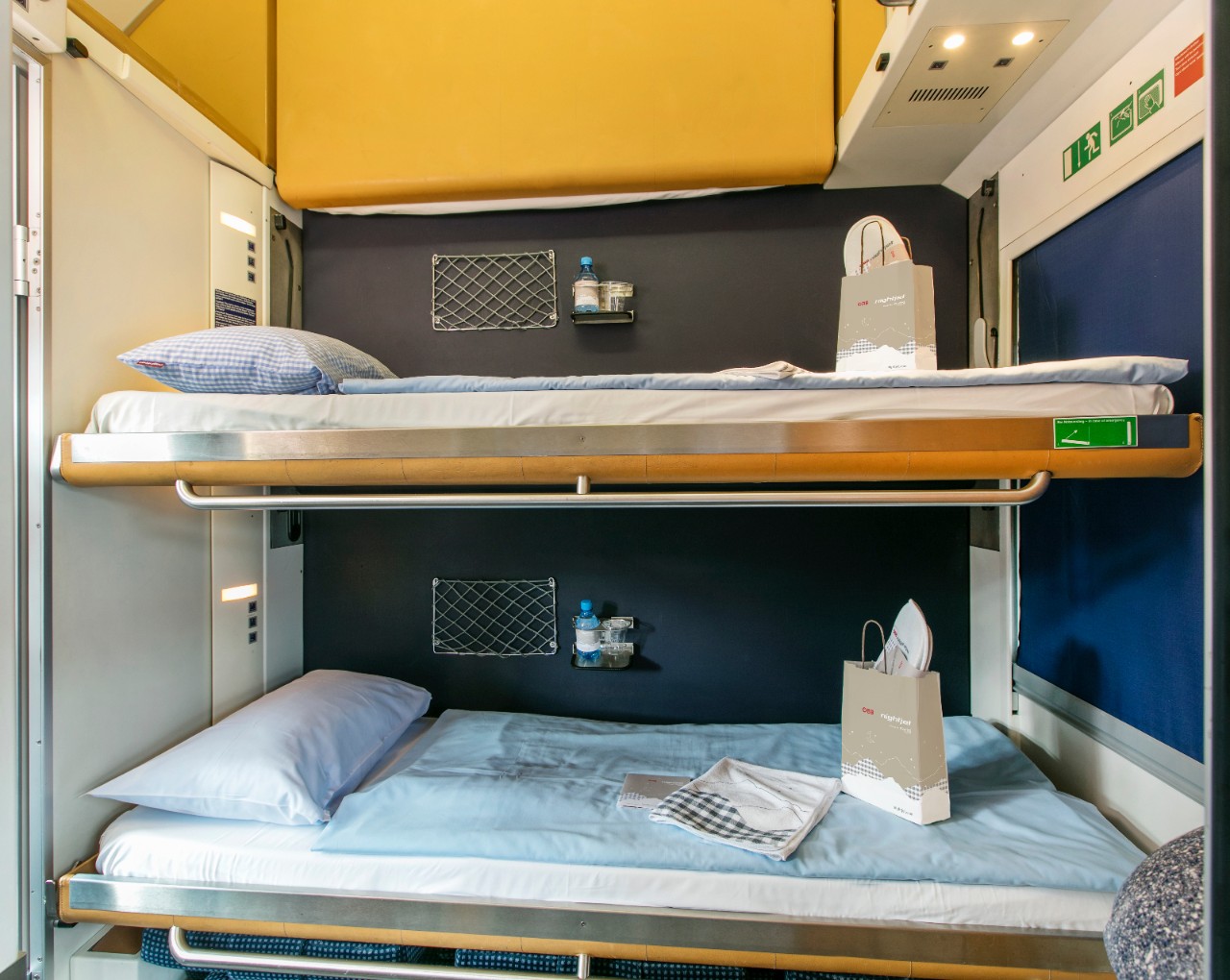 Sleeping car compartment in sleeping position.
